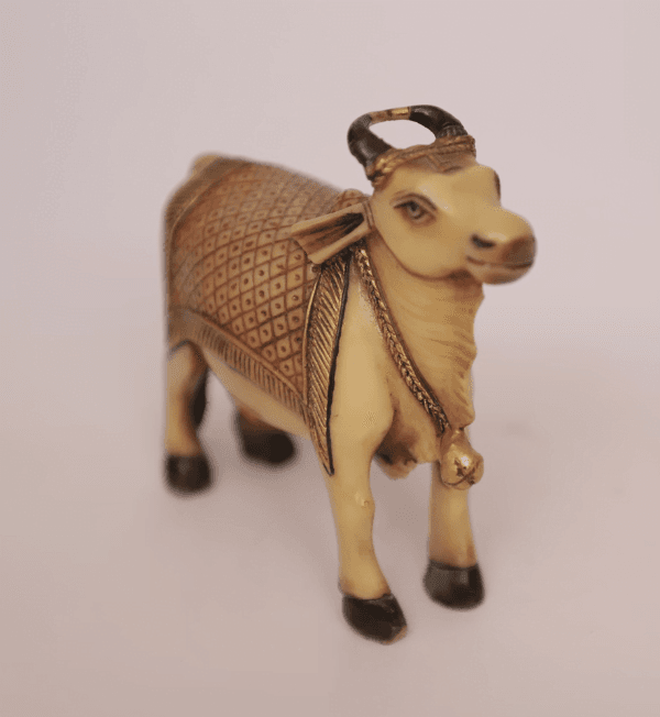 Handmade-Carved-Cow-Statue-in-Camel-Bone-2022-04-20-at-3.18.05-PM.png