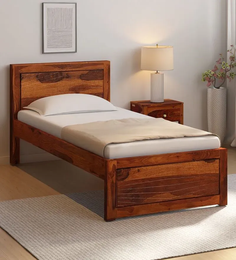 Nuevo Sheesham Wood Single Bed In Honey Oak Finish.webp